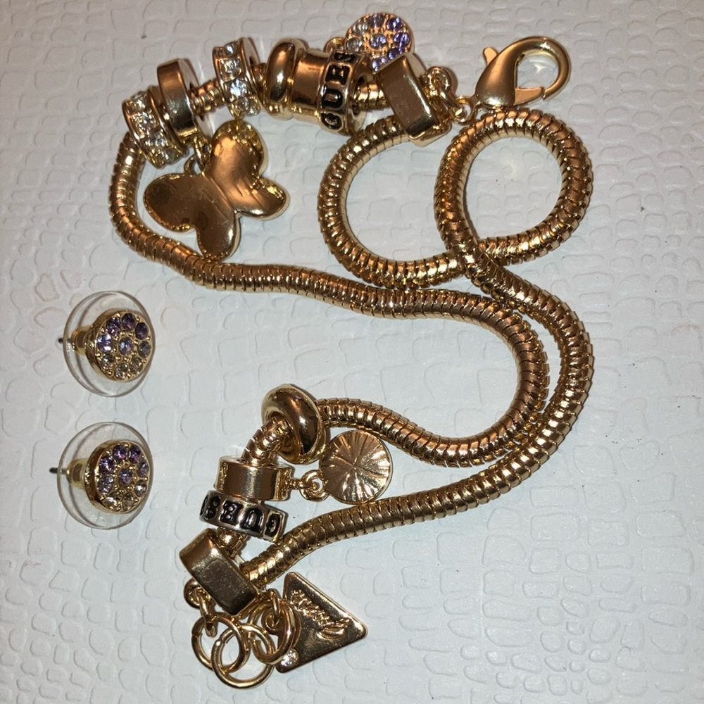 Gold and Silver Bracelet with Intricate Charms